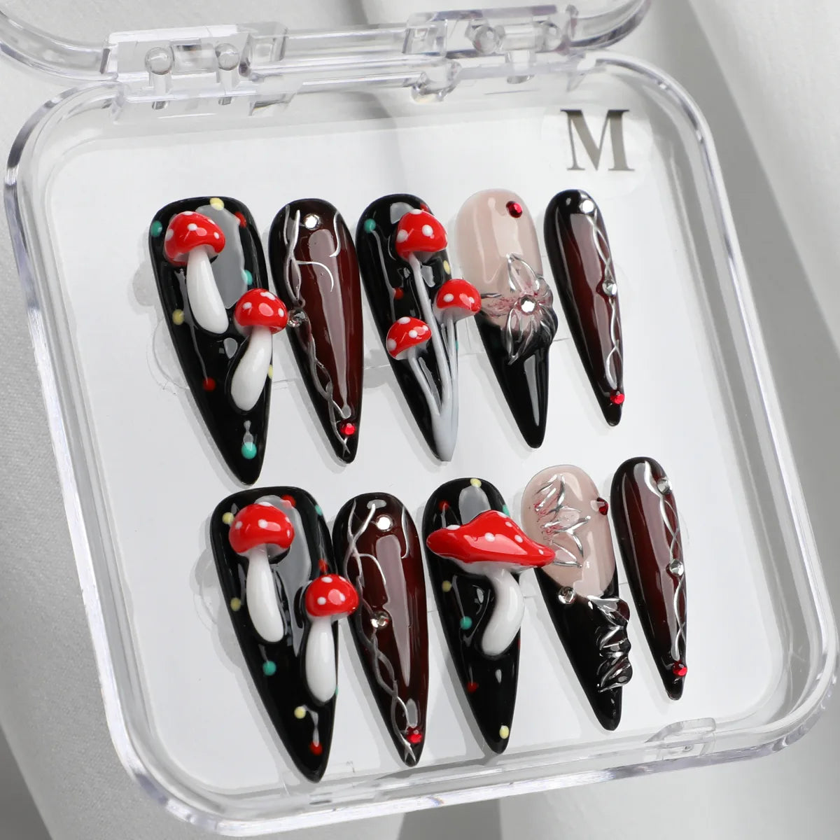 3D mushroom stiletto acrylic press-on nails in black and red