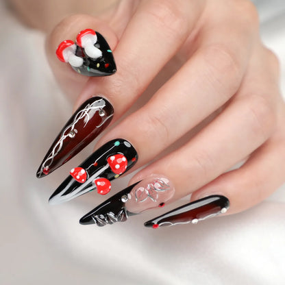Close up look of mushroom stiletto acrylic press-on nails