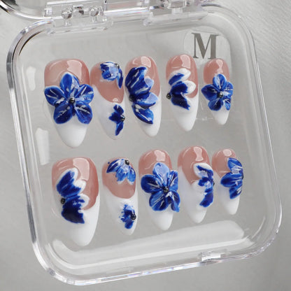 Handmade floral almond acrylic press-on nails inspired by porcelain