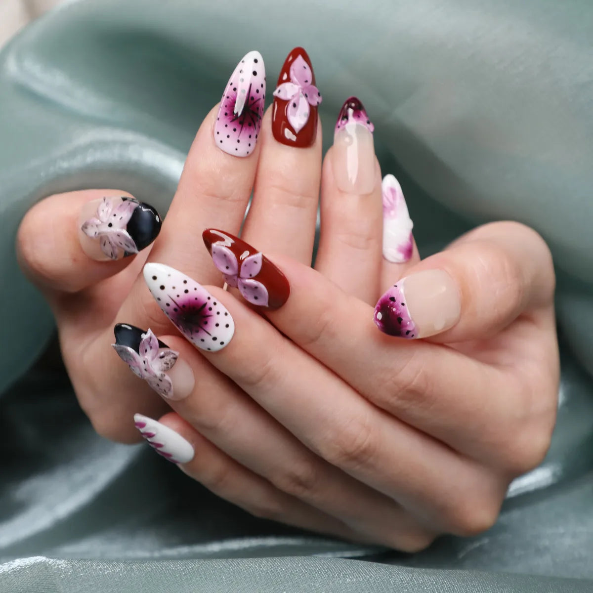 Burgundy and pink floral almond press-on nail design